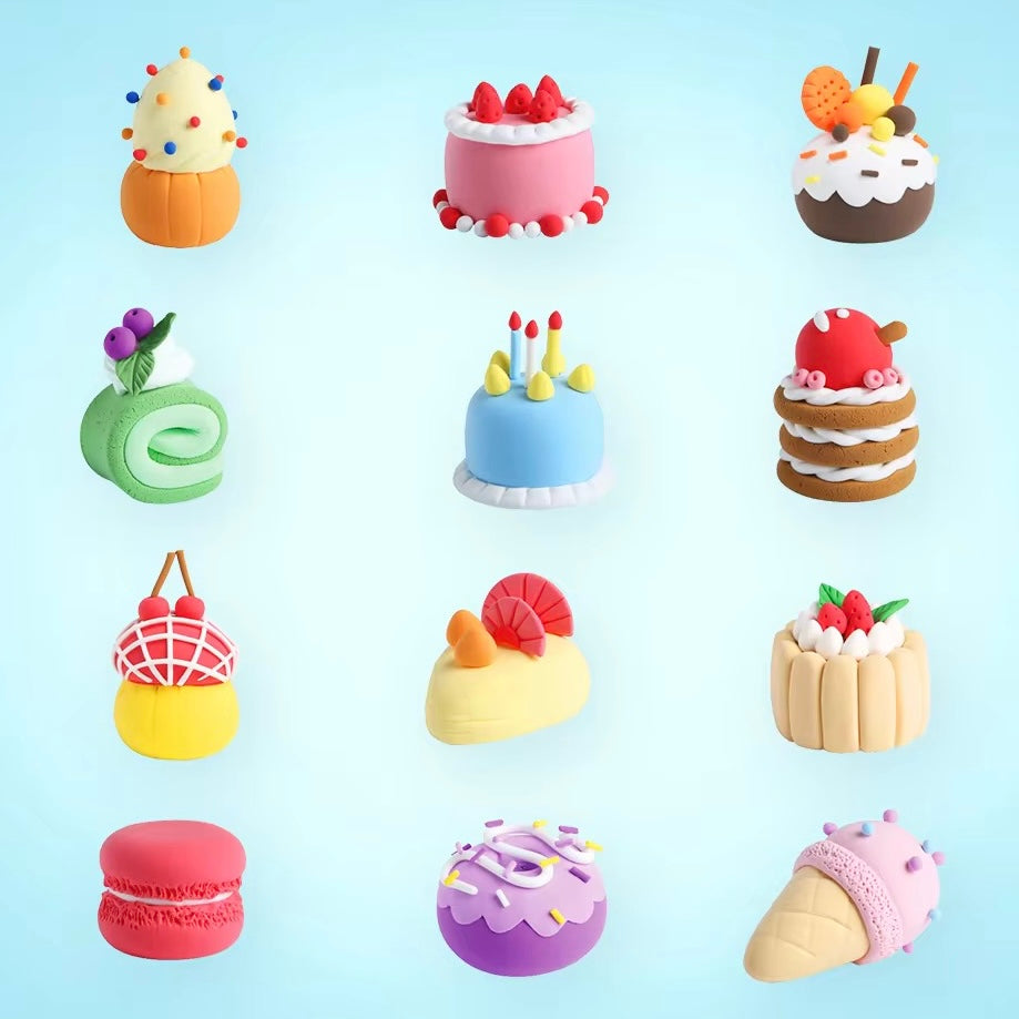 Twelve colorful dessert-themed clay figures made from soft air-dry clay, including cakes, macarons, fruit tarts, and ice cream. Displayed on a pastel background, this set is part of OLiHUG’s 12-piece One-Time Kit, perfect for creative, screen-free play and gift giving.