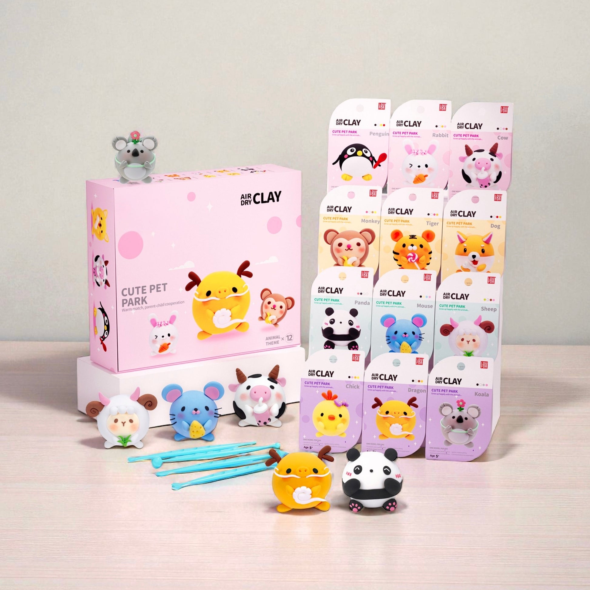 OLiHUG Cute Pet Clay Kit featuring 12 adorable animal figurines like panda, bunny, and puppy. Montessori-inspired air dry clay set for kids and families. Perfect gift for creative, screen-free playtime.