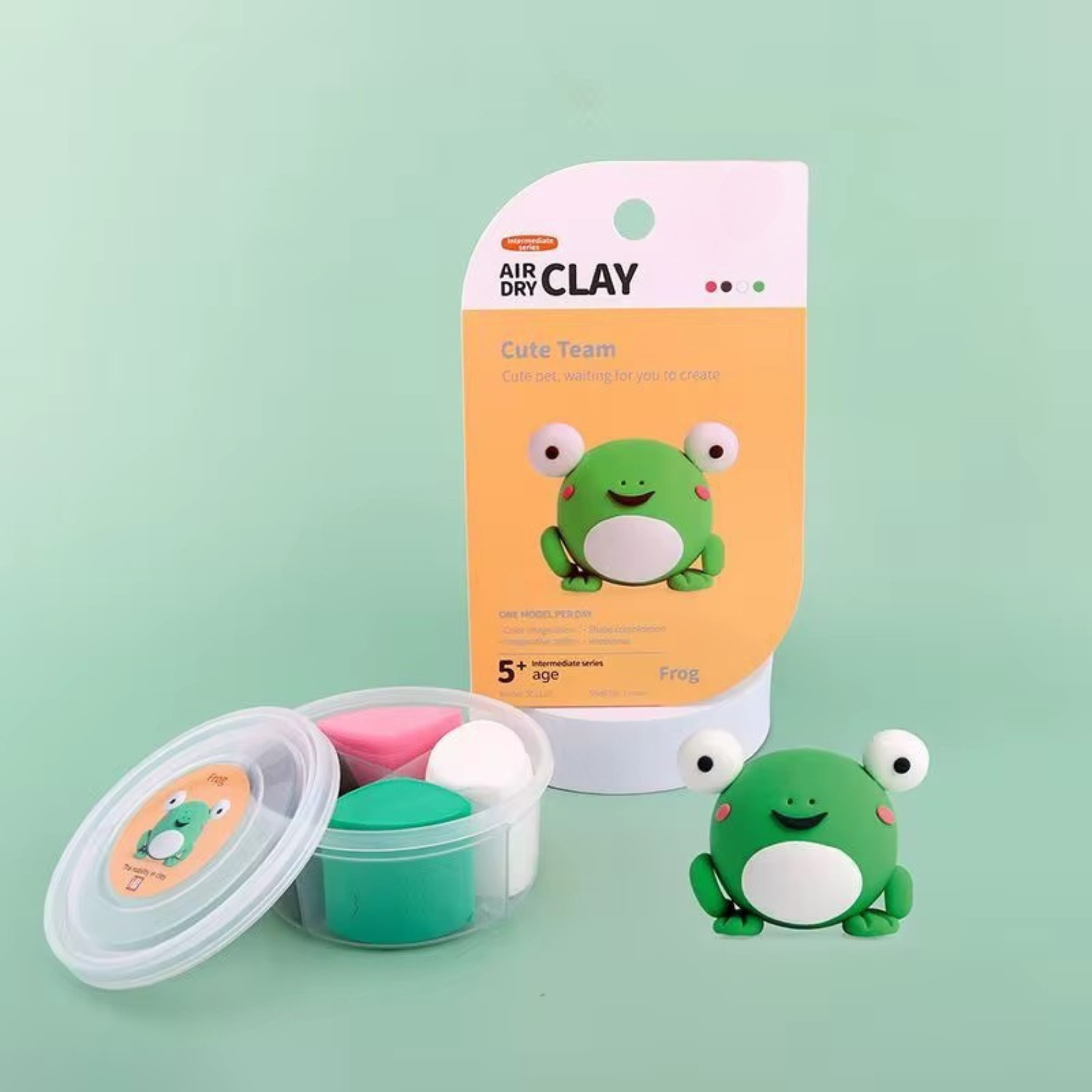 Frog clay craft project from OLIHUG’s animal-themed Pet Paradise set, pictured with matching safe color tubs and illustrated packaging — encourages fine motor development.