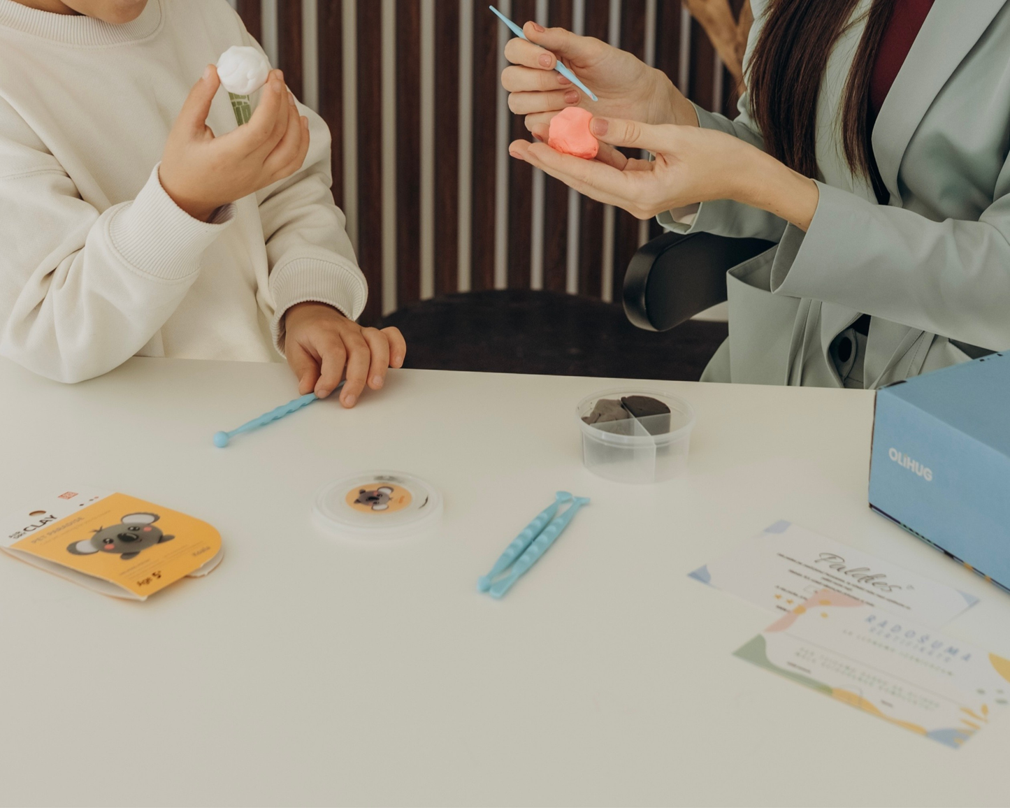 A happy child explores the OLIHUG Air Dry Clay Kit, shaping colorful clay with focus and joy. Montessori-inspired creative play builds fine motor skills, mindfulness, and calm connection. Perfect for parents seeking meaningful, screen-free family time. Trusted by hundreds of families who transformed playtime into creative peace.